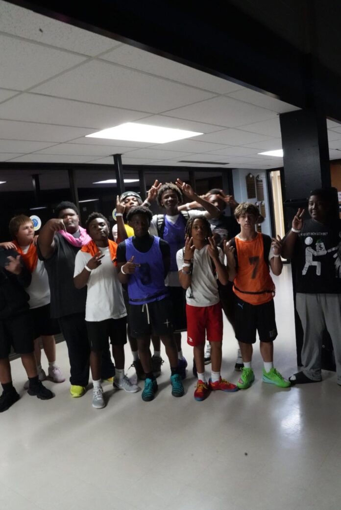 Title Midnight Basketball Program in Evansville Young people participating in the Midnight Basketball program at CK Newsome Community Center in Evansville, Indiana.